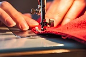 a cloth being sewn