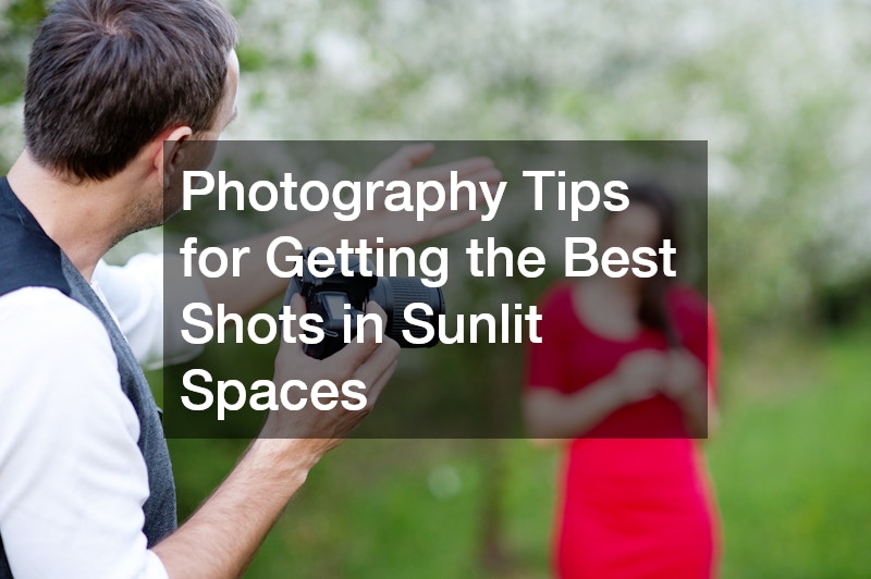photographer preparing to take a photo of a woman in a red dress